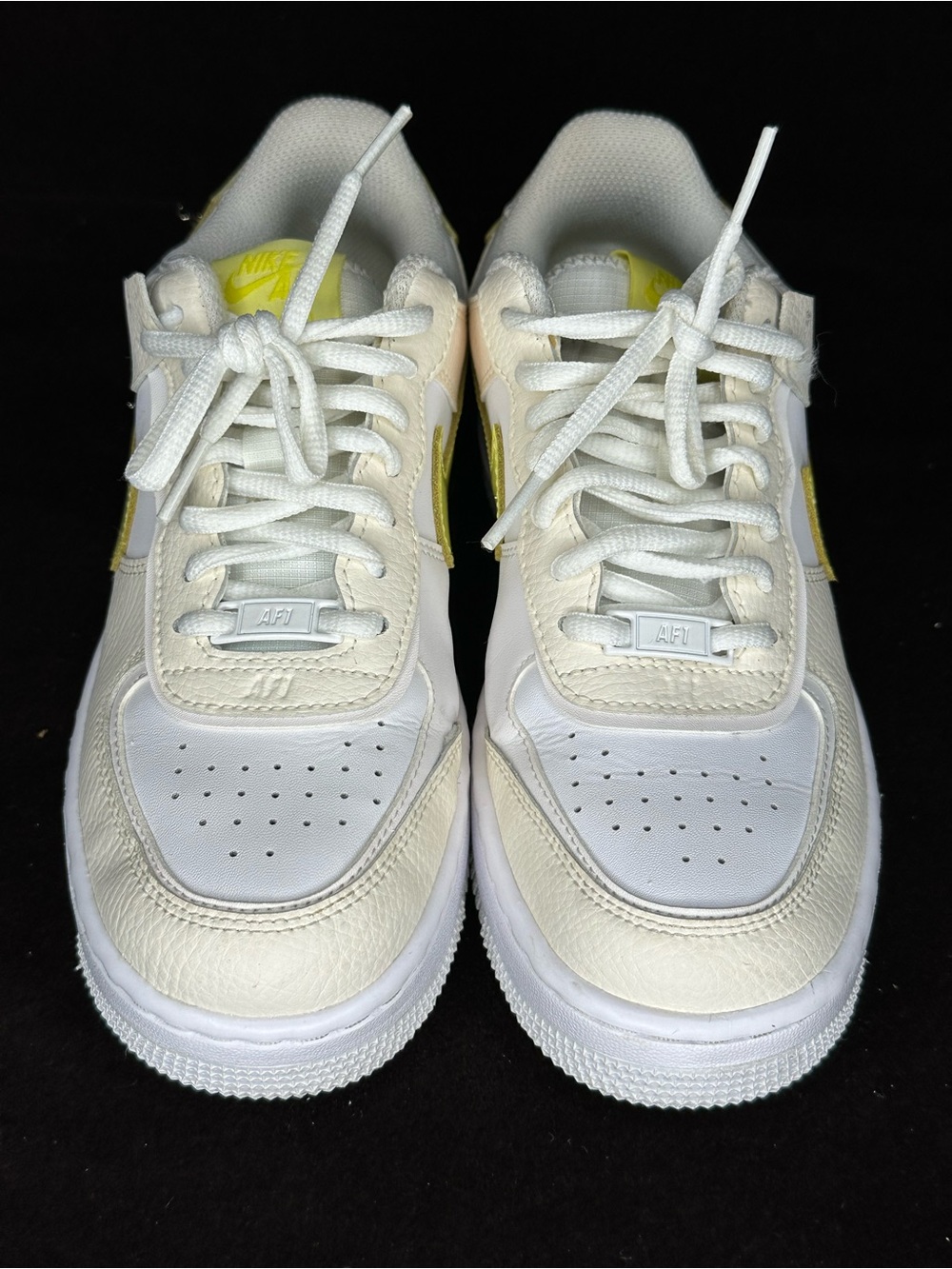 Nike White Sneakers with Yellow Accents